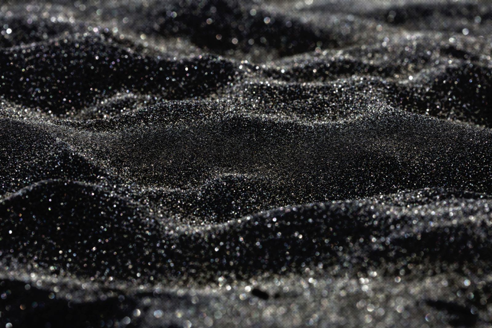 Черный песочный. Черный песочный. Черный вулканический песок. Black sand background. Черный песок.