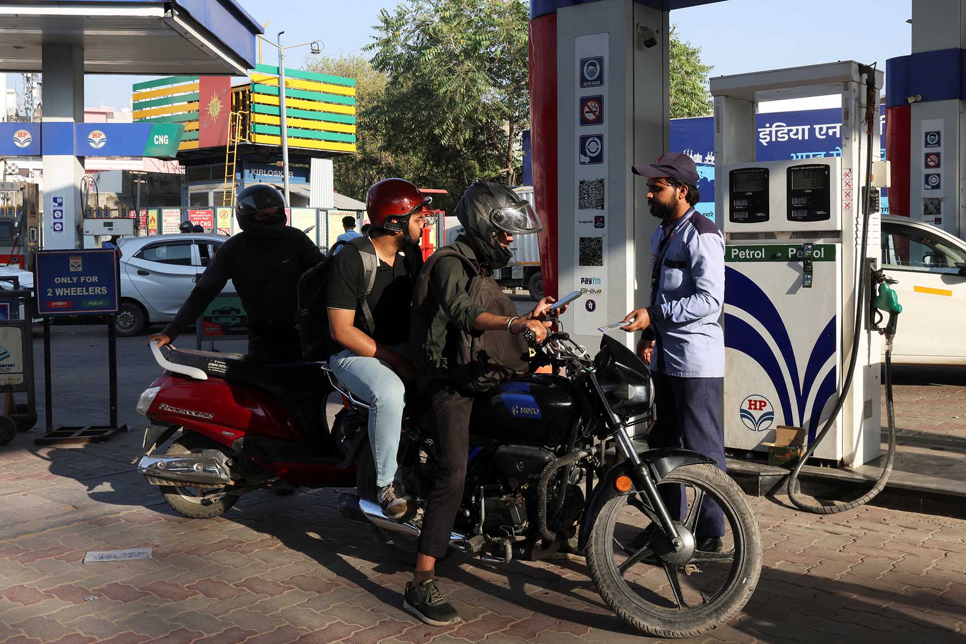Govt slashes fuel taxes, brings back windfall levies as crude surges
